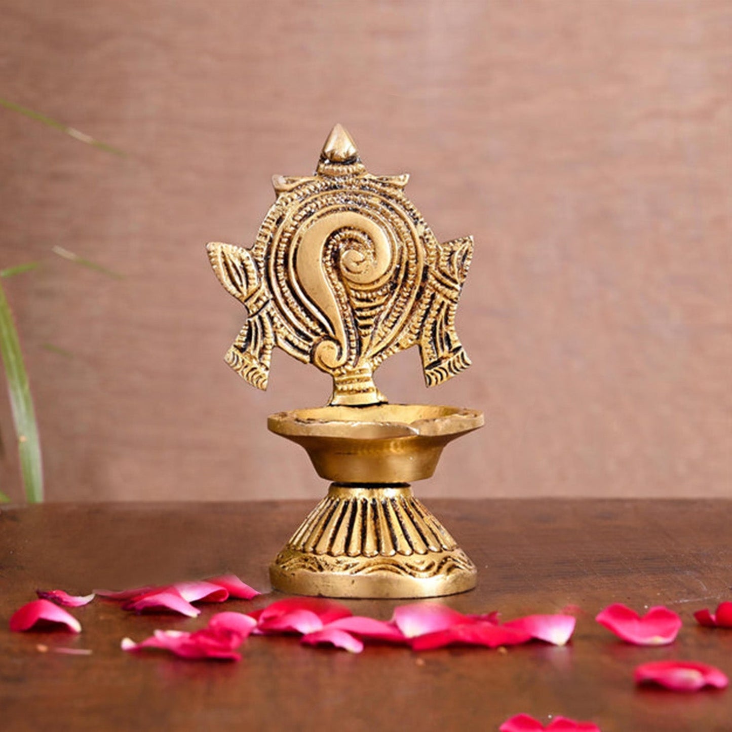 Brass Diya Shankh Chakra Brass Diya (4.5 Inches H * 3.5 Inches L * 2.5 W)