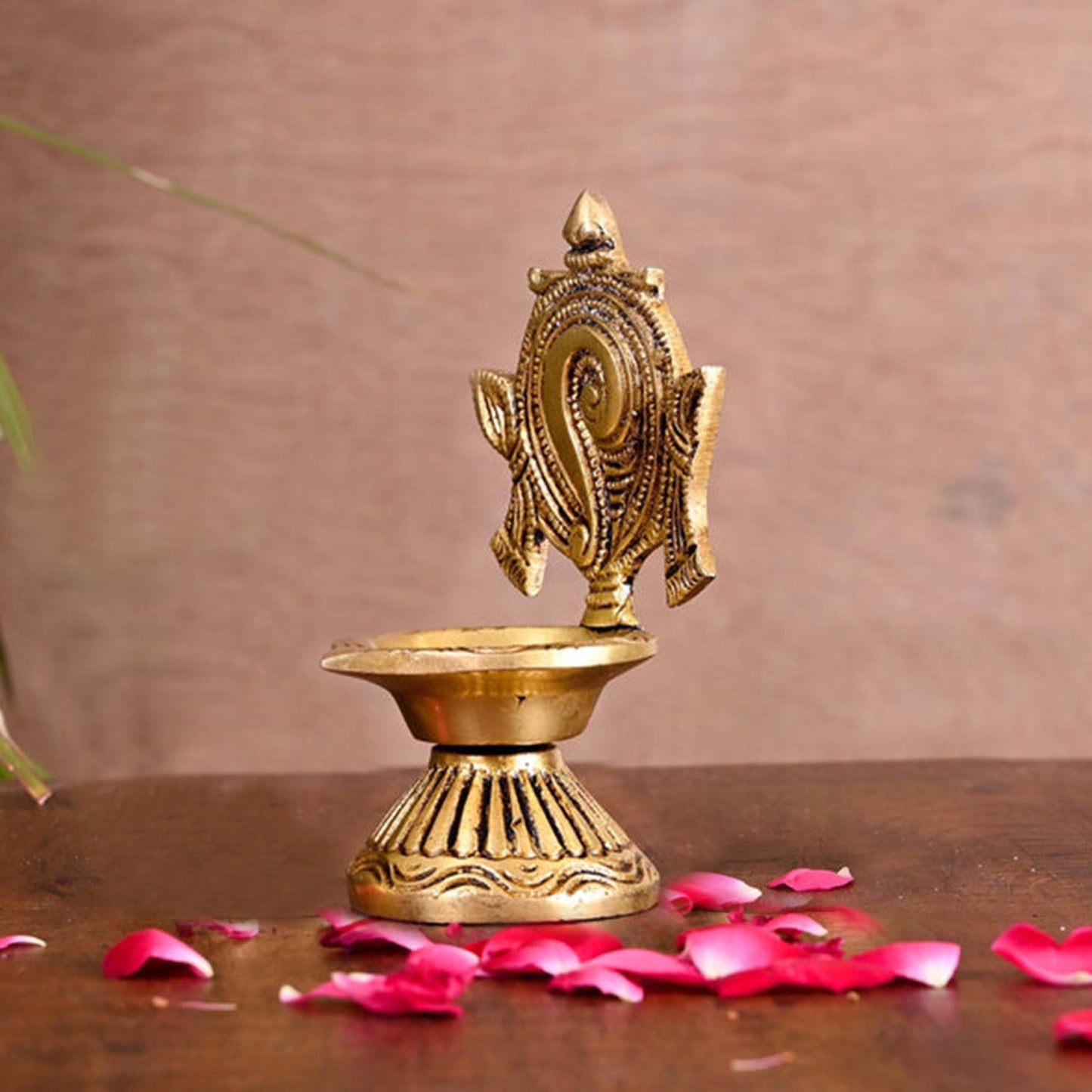Brass Diya Shankh Chakra Brass Diya (4.5 Inches H * 3.5 Inches L * 2.5 W)