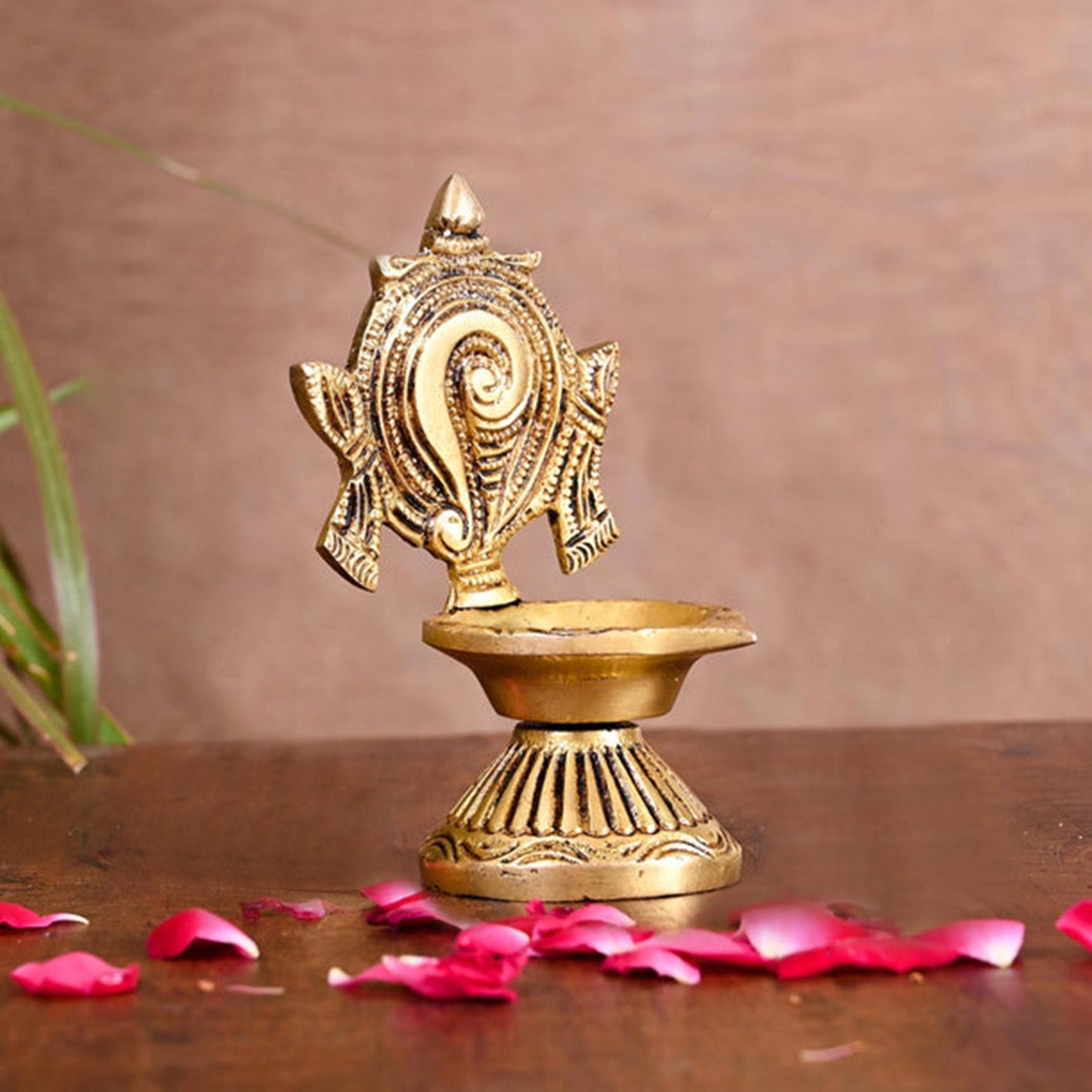 Brass Diya Shankh Chakra Brass Diya (4.5 Inches H * 3.5 Inches L * 2.5 W)