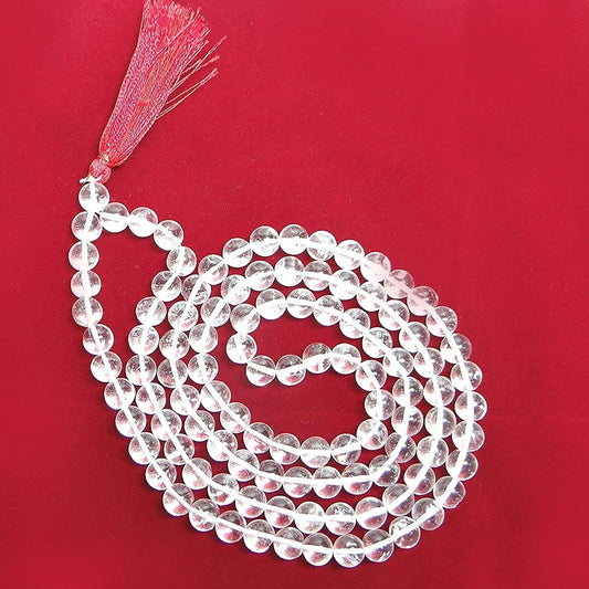 Close-up of Sphatik Jaap Mala (Quartz) with 108 beads and Gaumukhi Jaap Bag for Pooja.