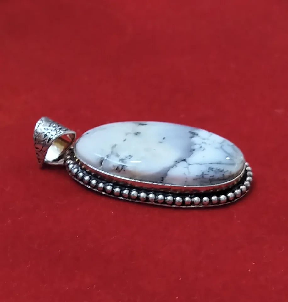 Close-up of Natural White Howlite Pendant – Oval Healing Crystal for Stress Relief and Sleep