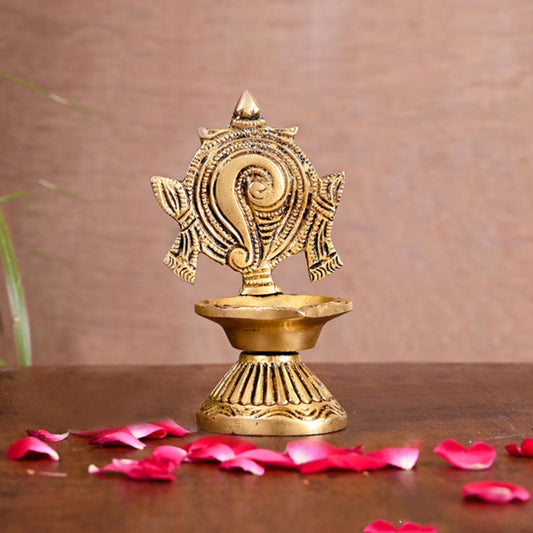 Brass Diya Shankh Chakra Brass Diya (4.5 Inches H * 3.5 Inches L * 2.5 W)