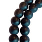 A beautifully arranged Narayan Shaligram Mala with 108 + 1 beads, emphasizing the sacred stones and their spiritual significance in a puja setting.